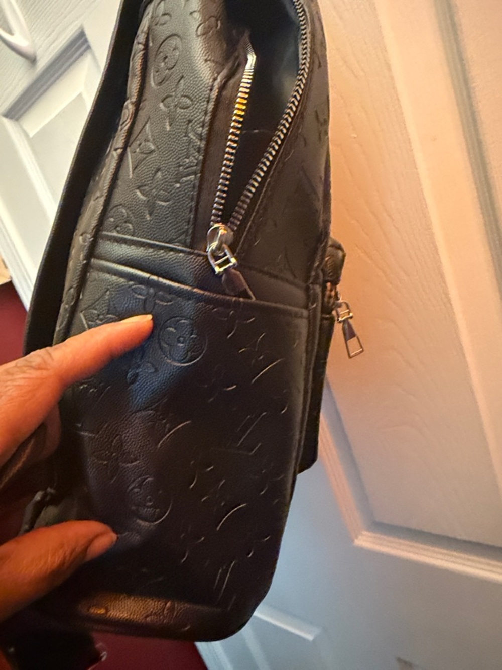 Embossed Monogram Black Backpack - Picture 9 of 11